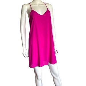 Style Rack Pink Chemise with Spaghetti Straps and V-Neckline
Size S.
